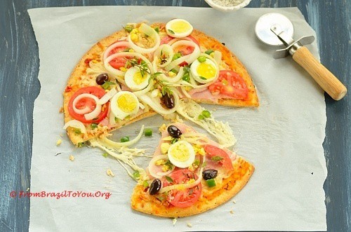 pizza a portuguesa with sliced boiled egg topping