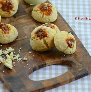 Biscoito de nata cookies with dulce de leche topping on a wooden board