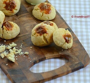 Biscoito de nata cookies with dulce de leche topping on a wooden board