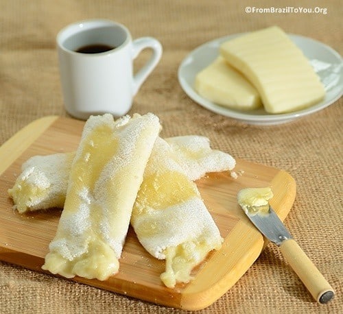 White tapioca crepes filled with cheese on a serving board