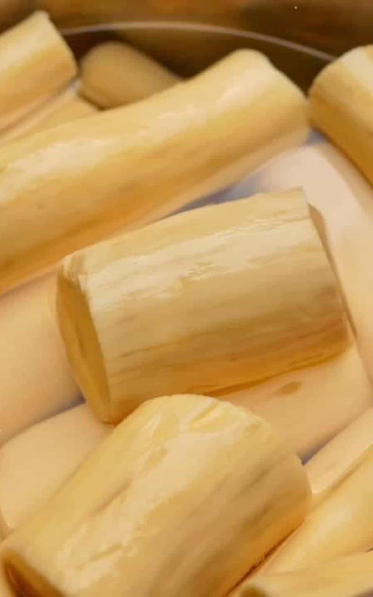 a pot with yuca root and water for boiling