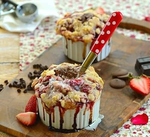 Chocolate-Strawberry Slump with a red handle serving spoon
