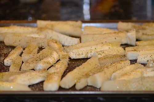 Yuca sticks are about to be roasted