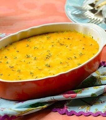 Brazilian tamale casserole in a red dish