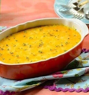 Brazilian tamale casserole in a red dish