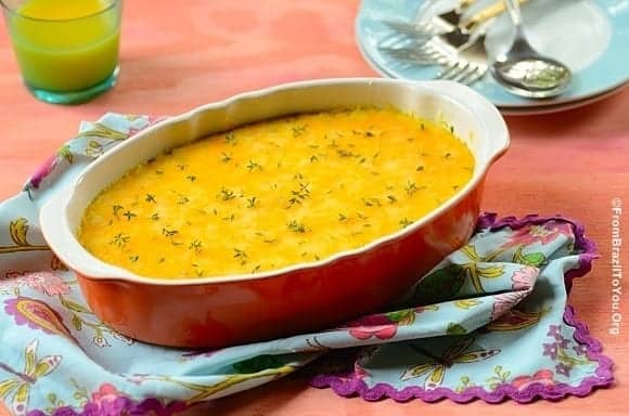 Brazilian tamale casserole in a red dish