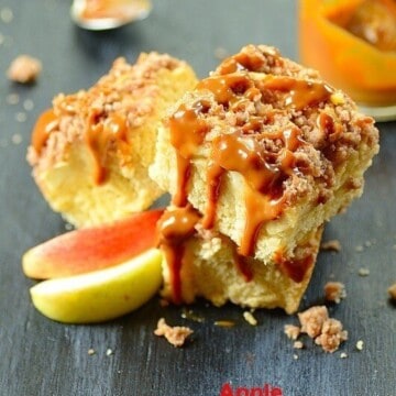 slices of apple crumb cake with dulce de leche on top