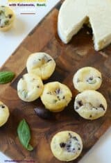 gluten-free dinner rolls with kalamata and other garnishes on the side