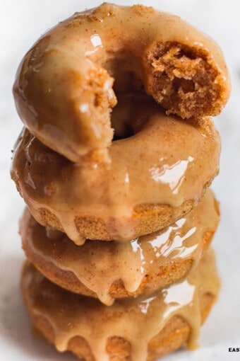 a pile of apple cider baked donuts.