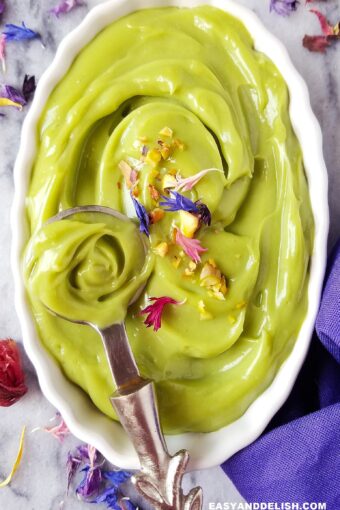 close up of avocado mousse being spooned