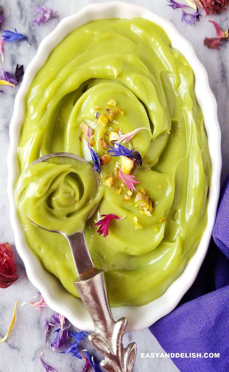 close up of avocado mousse being spooned