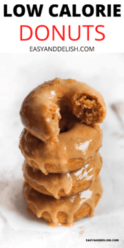 close up of a pile of baked donuts glazed on top