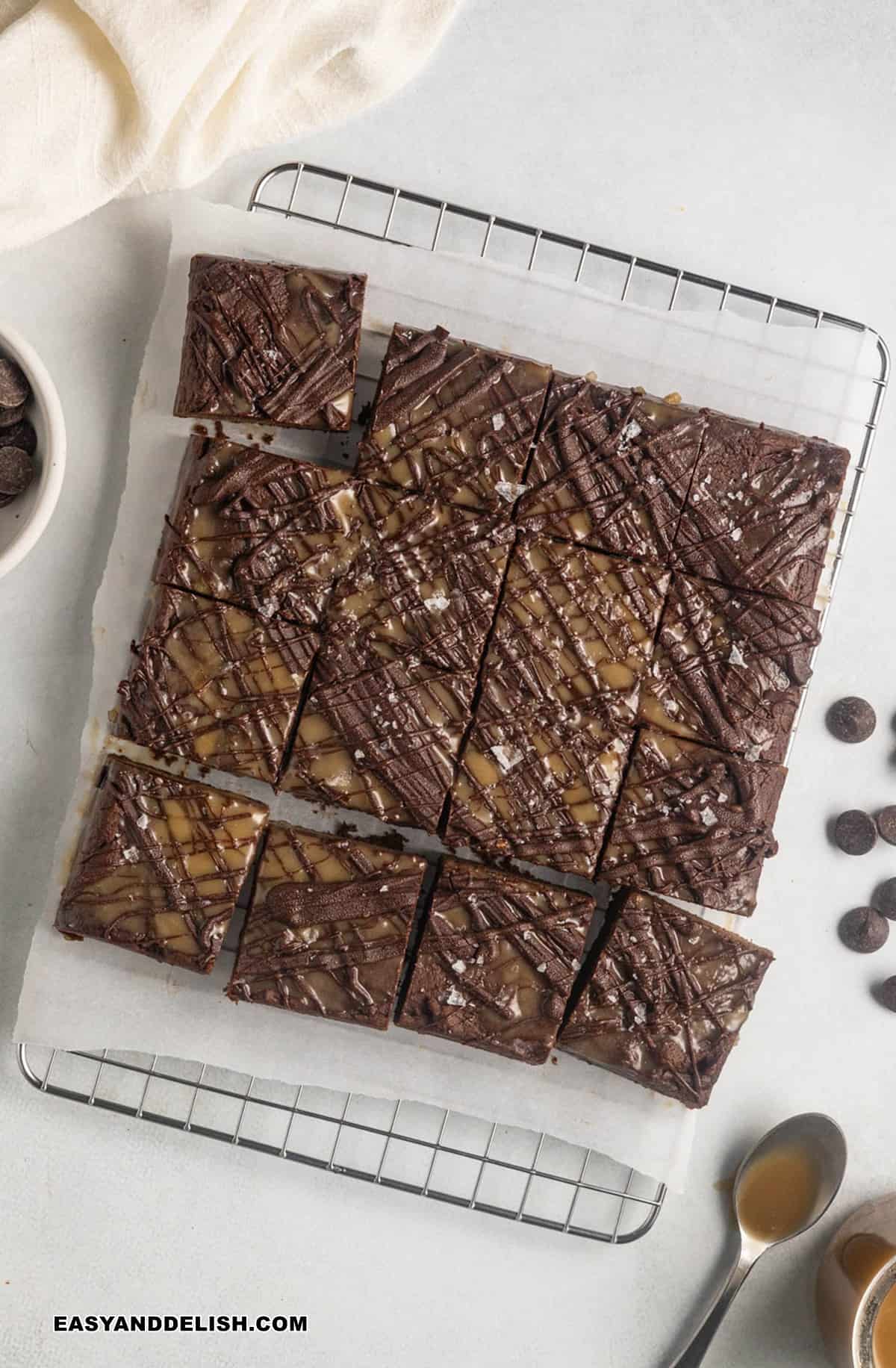 sliced sweet potato brownies on a rack.