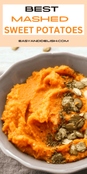 close up of a bowl of cooked root vegetables with pepitas on top.