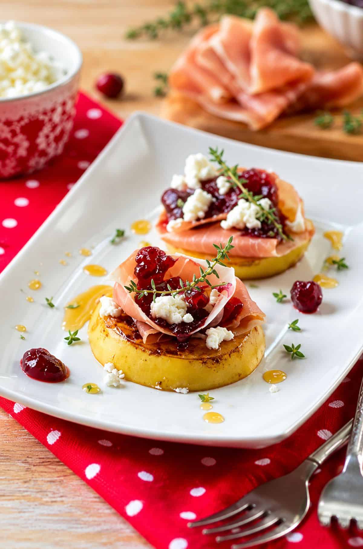 Brûléed pears with prosciutto, cranberry sauce, goat cheese, and fresh thyme.