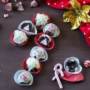 no bake chocolate candy cane cheesecake cookies in truffle wrappers