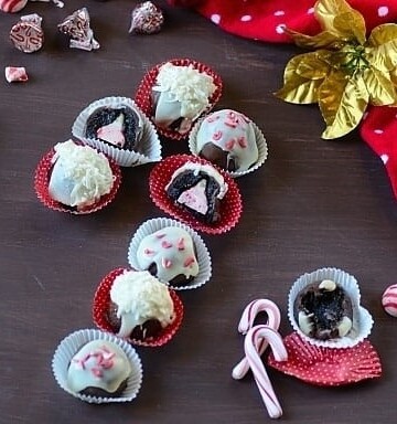 no bake chocolate candy cane cheesecake cookies in truffle wrappers