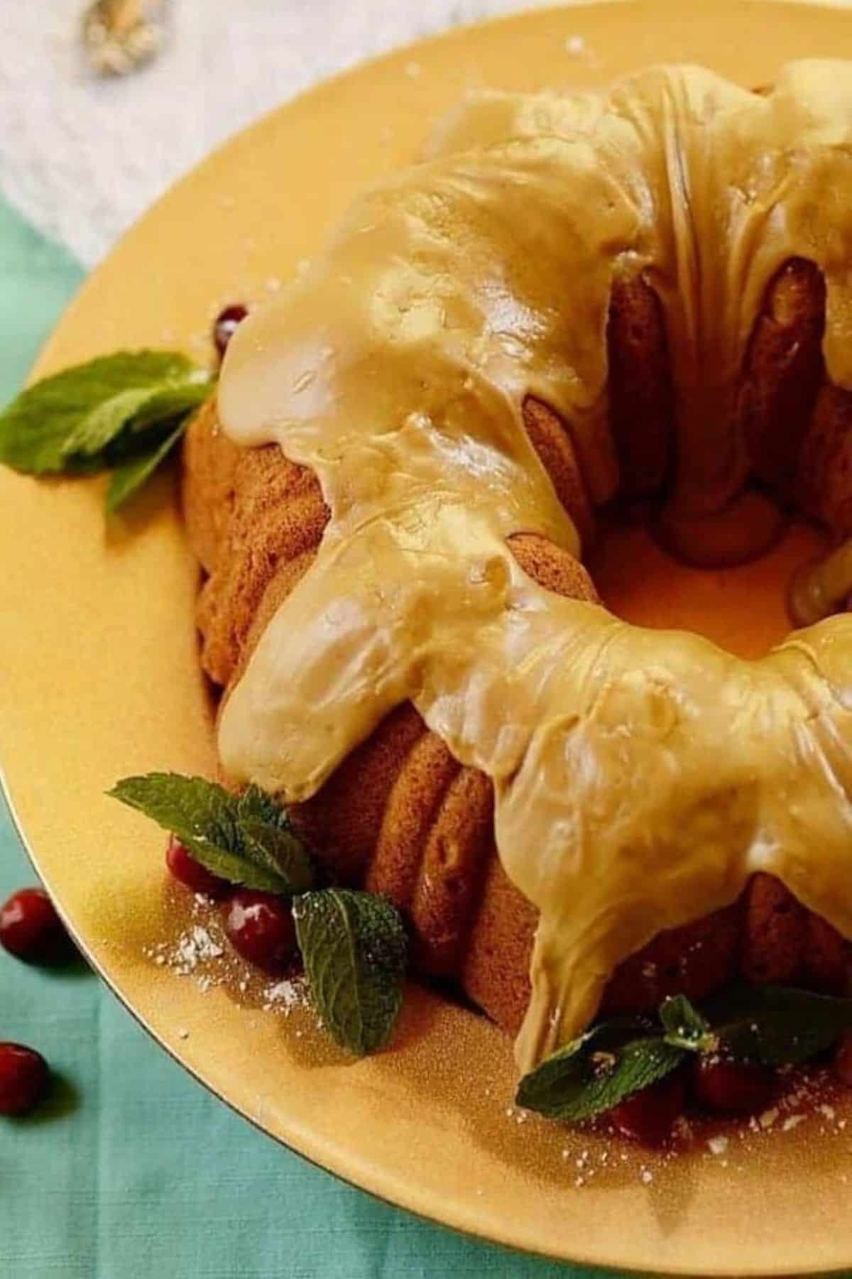Spiced sweet potato pound cake with caramel frosting and warm fall spices.