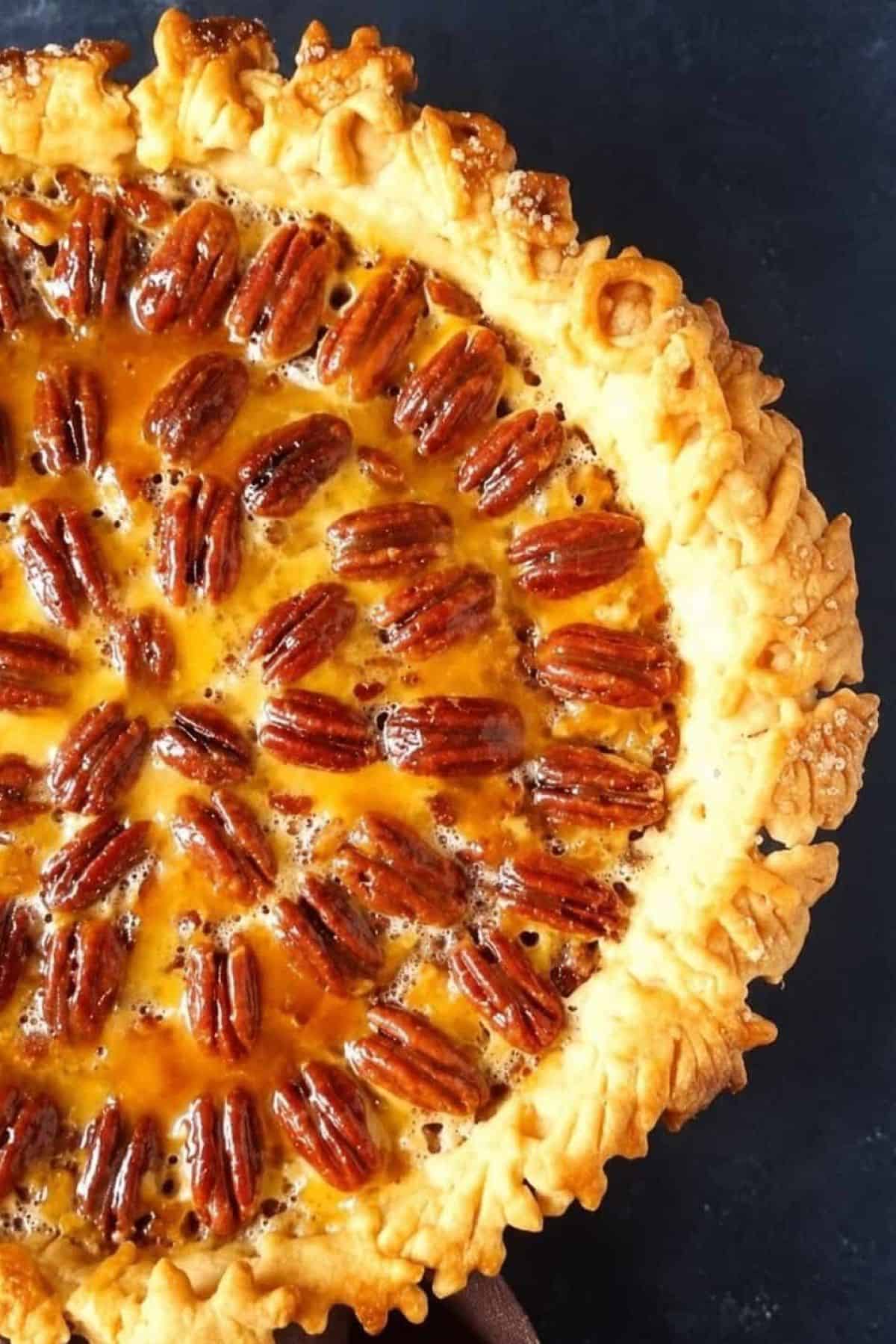 Rich and gooey with crunchy pecans on top Texas Pecan Pie.