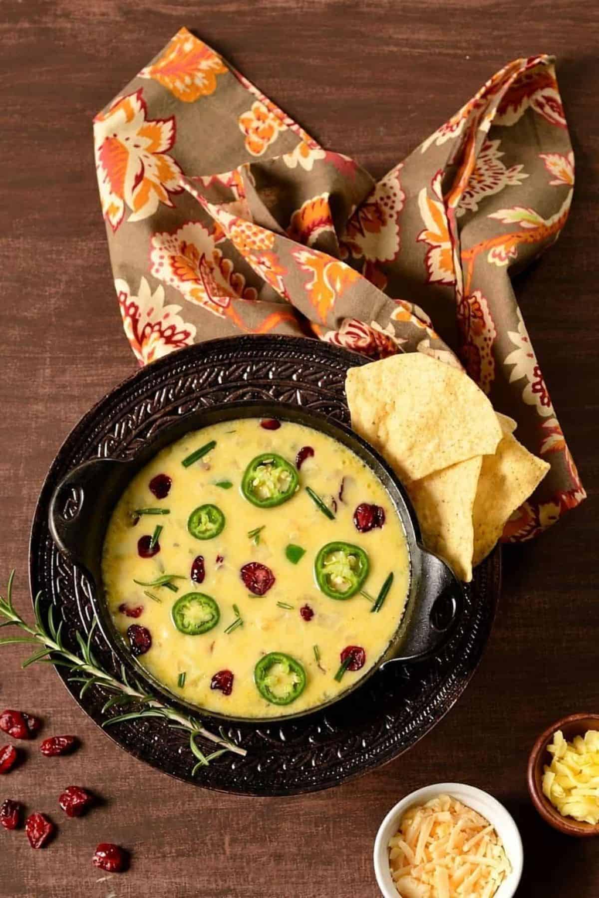 Cranberry Jalapeño Queso Fundido mix of creamy, sweet, and spicy flavors.