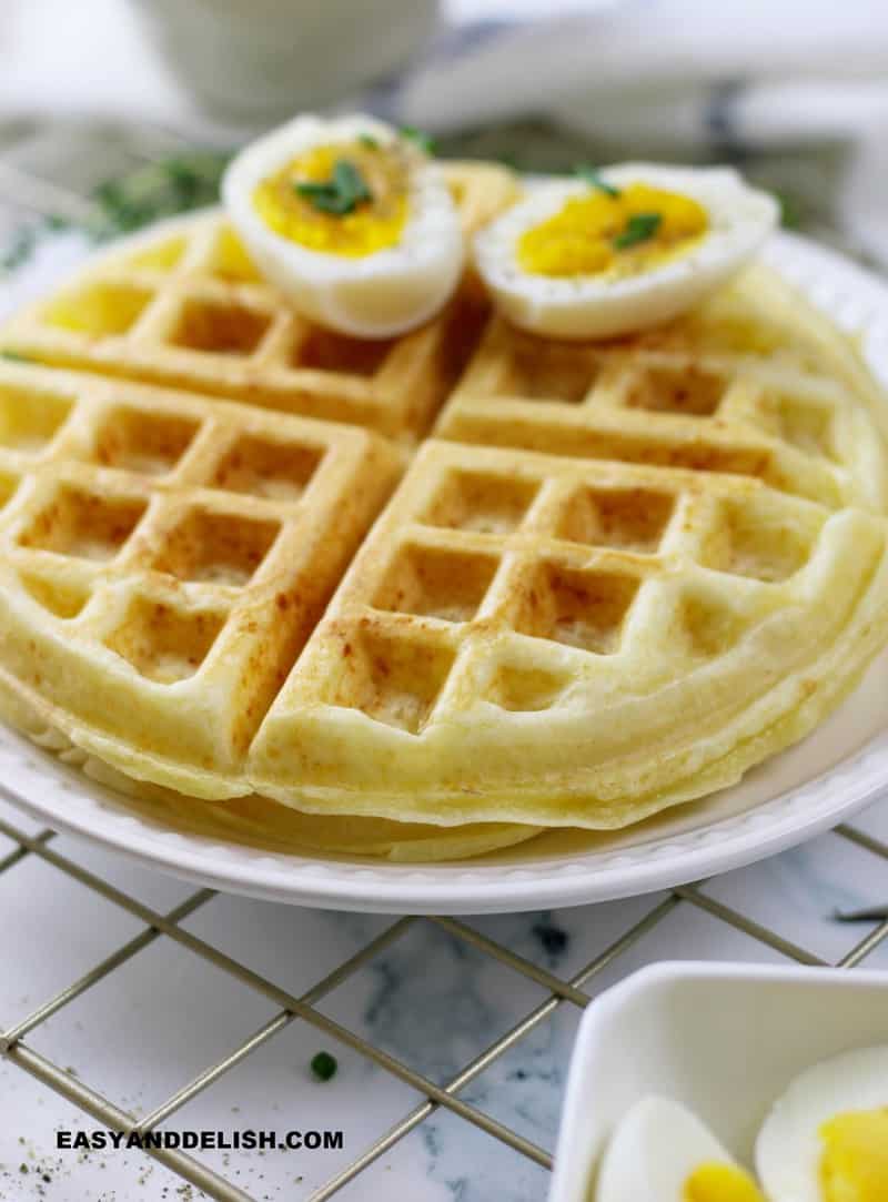 close up of gluten-free waffles piled on a plate