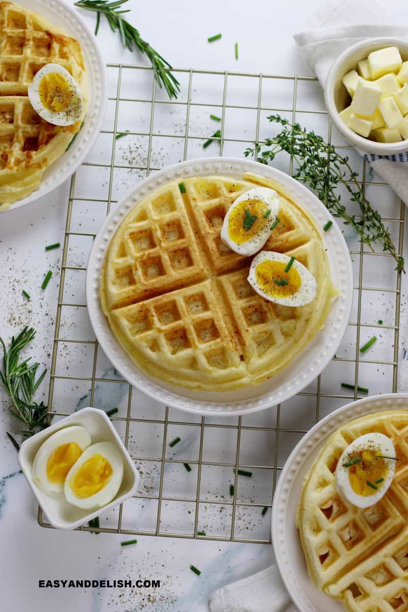 breakfast over a rack with soft boiled eggs and herbs