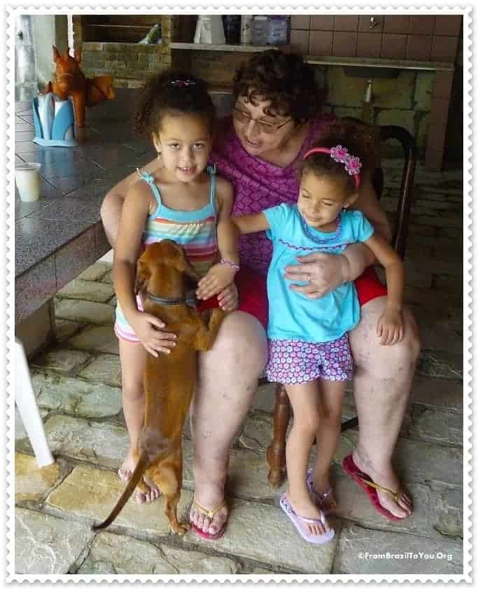 My children with Aunt Graça and her dog in Porto de Galinhas Beach...