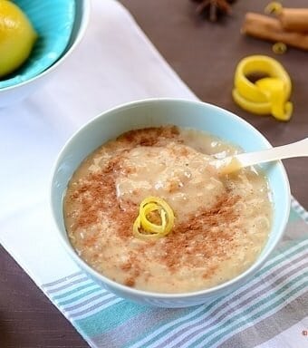 A bowl of rice pudding on a table