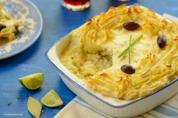 bacalhau a ze do pip partially eaten in a baking dish