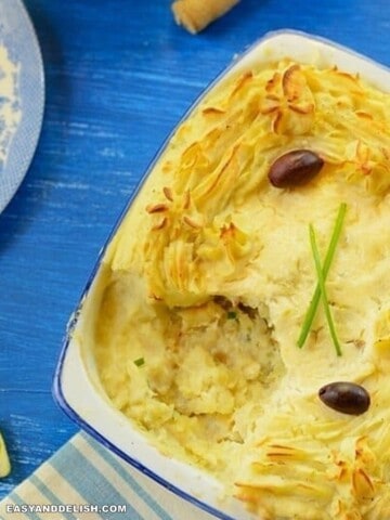 fish pie (bacalhau a ze do pipo) in a baking dish with a spoon of it removed