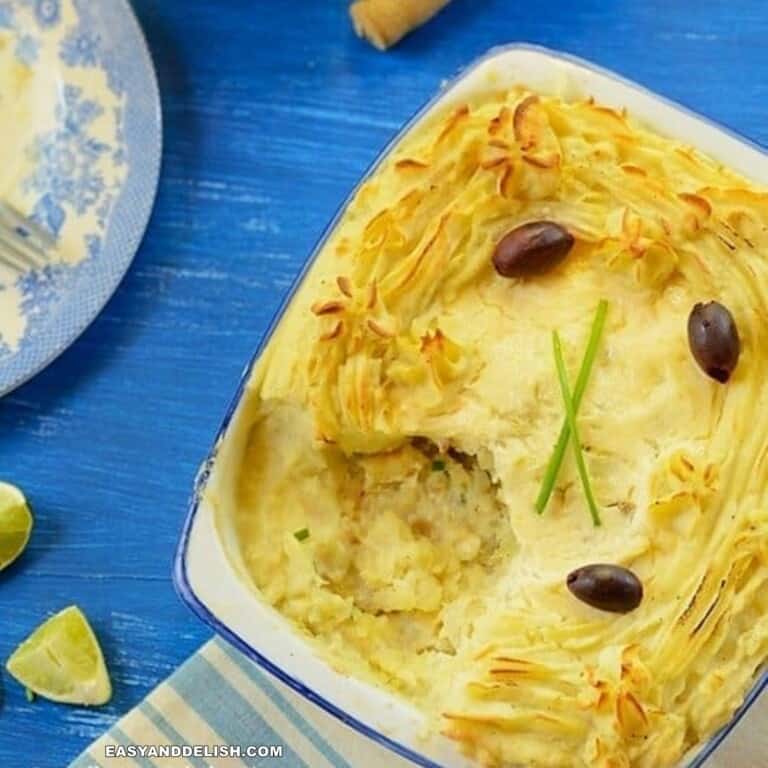 fish pie (bacalhau a ze do pipo) in a baking dish with a spoon of it removed