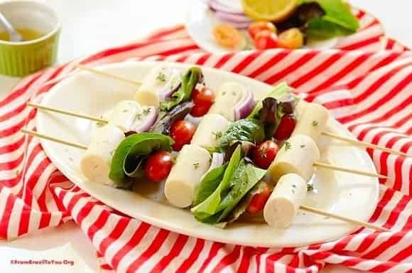 Hearts of palm and tomatoes and lettuce on kabob skewers
