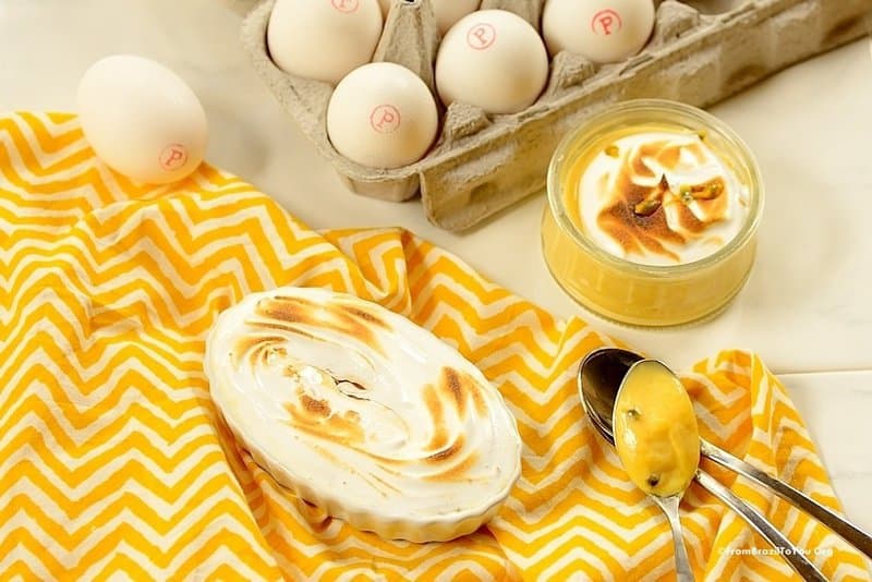 passion fruit pies on a table with a bow of eggs on the background