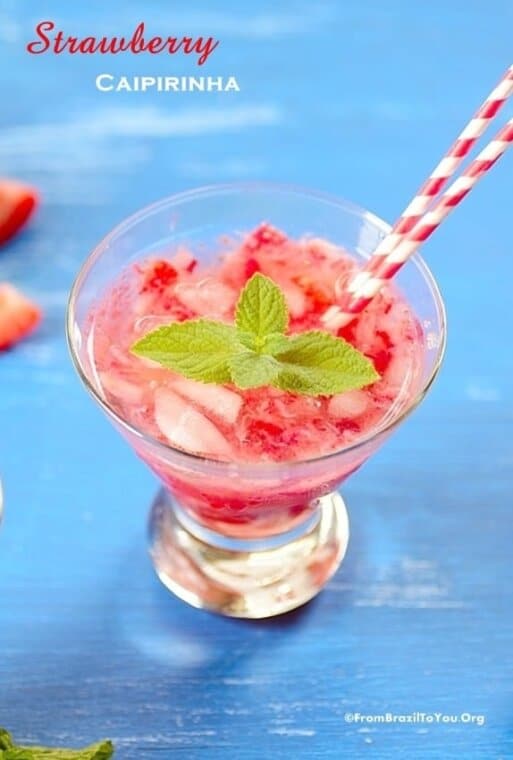 Strawberry caipirinha with straws