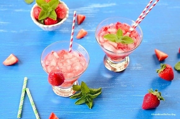 glasses of strawberry caipirinha cocktail