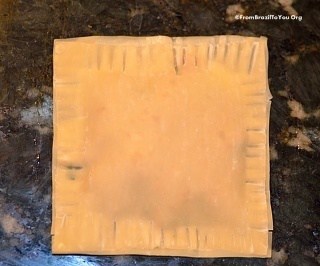 empanadas with beef filling, sealed and ready for frying