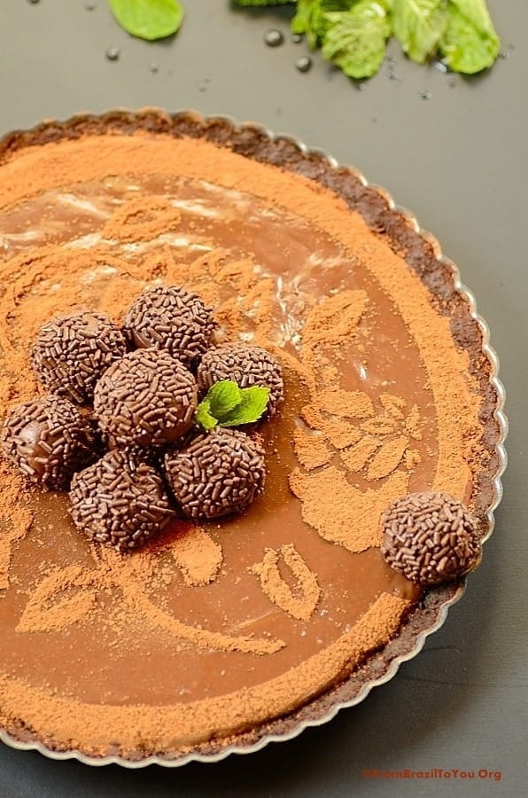 Close up image showing half of the Triple Brigadeiro Cheesecake Tart