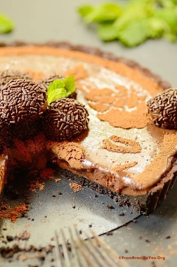 close up of Sliced Triple Brigadeiro Cheesecake Tart