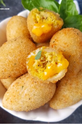 close up of coxinha (Brazilian chicken croquettes) in a bowl.