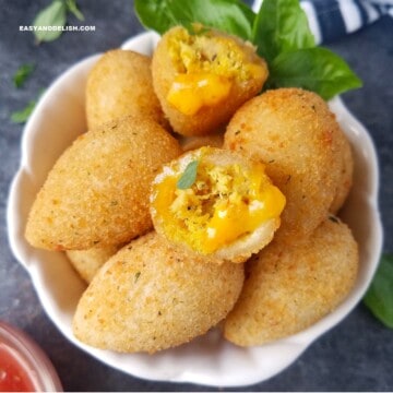 close up of coxinha (Brazilian chicken croquettes) in a bowl.