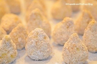 coxinhas that have been dredged in flour and are ready for frying