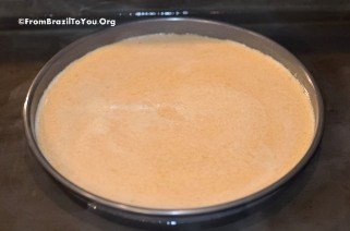 Flan mixture poured into a pan