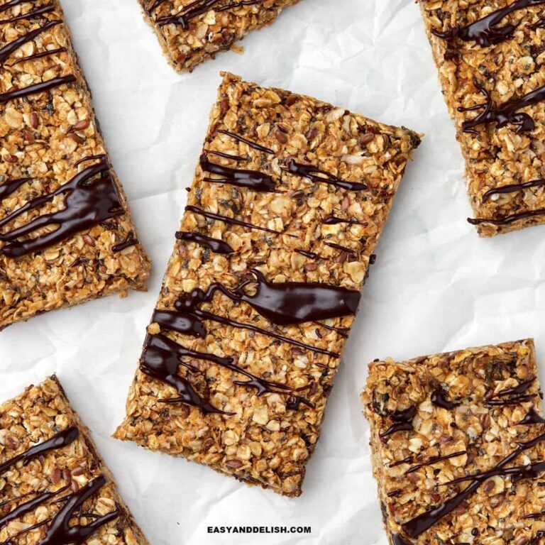 Close up of homemade energy bars drizzled with melted chocolate.