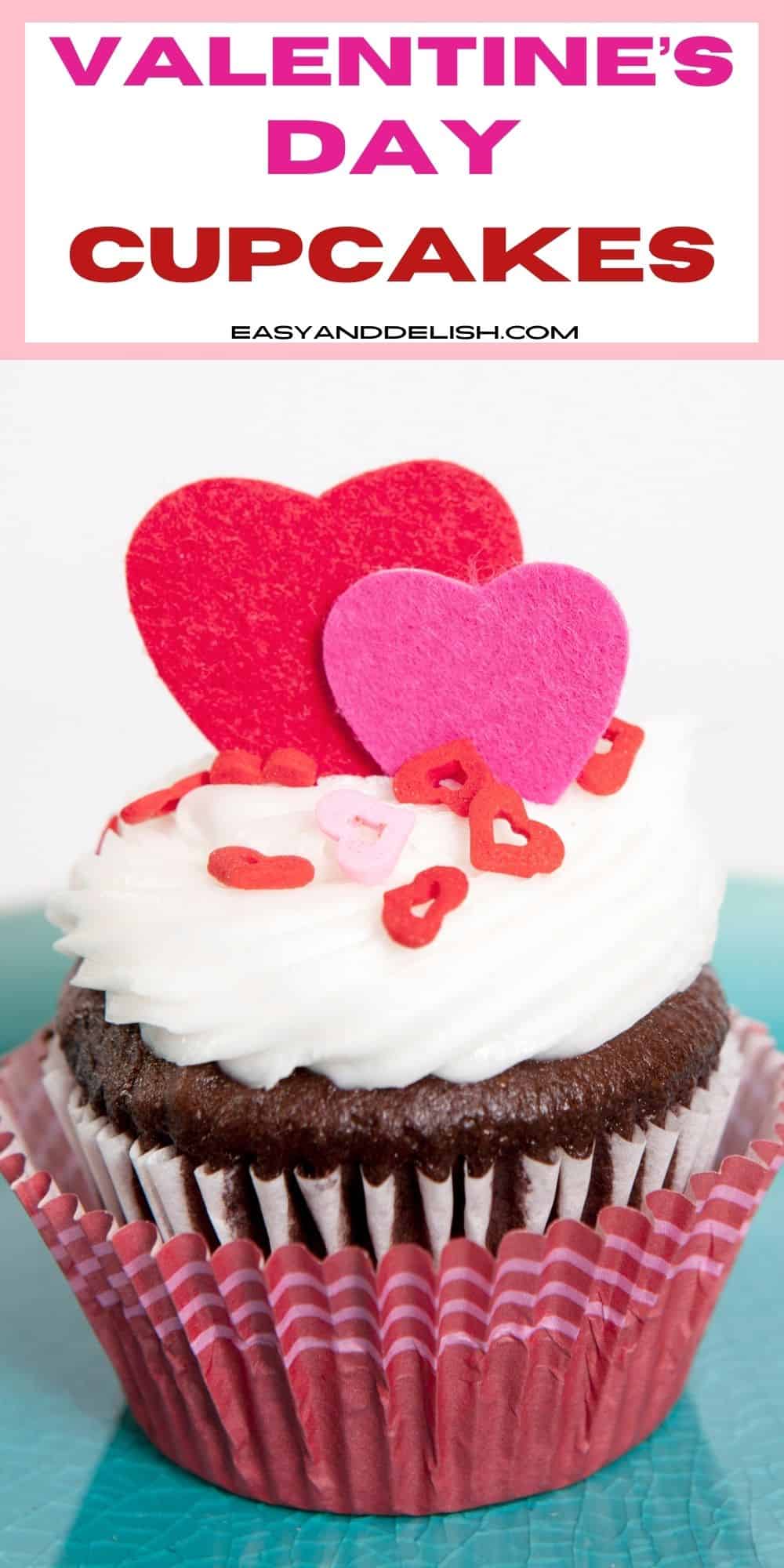 Valentine's day chocolate cupcakes filled with guava paste and topped with cream cheese frosting and sprinkles served on a plate.