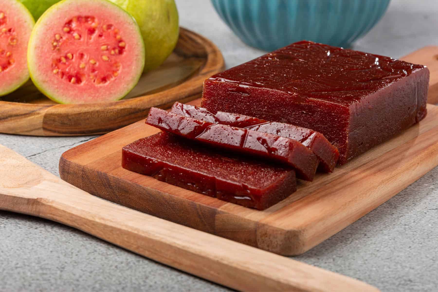 Sliced guava paste in a cutting board. 