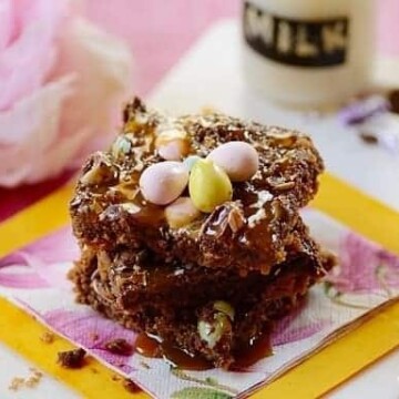 Easter cookie bars topped with pastel chocolate mini easter eggs