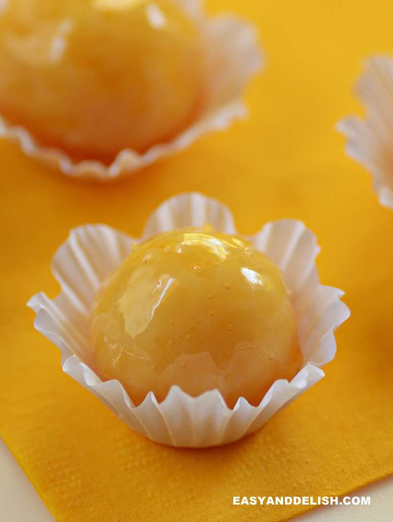 close up of a caramel candy with a soft center