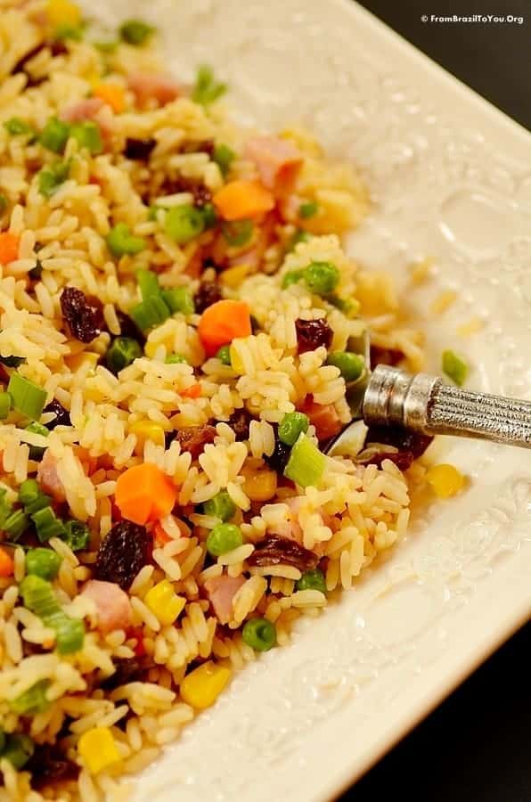 A plate of food with rice and vegetables