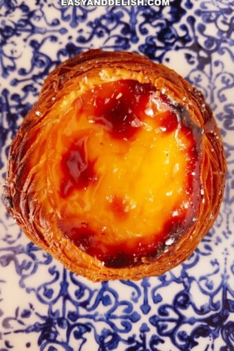 close up of pastel de nata over a plate