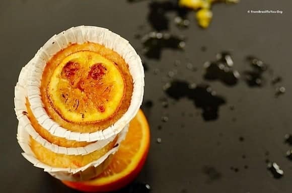 A stack of queijadinhas de laranja or Brazilian Orange Coconut Muffins